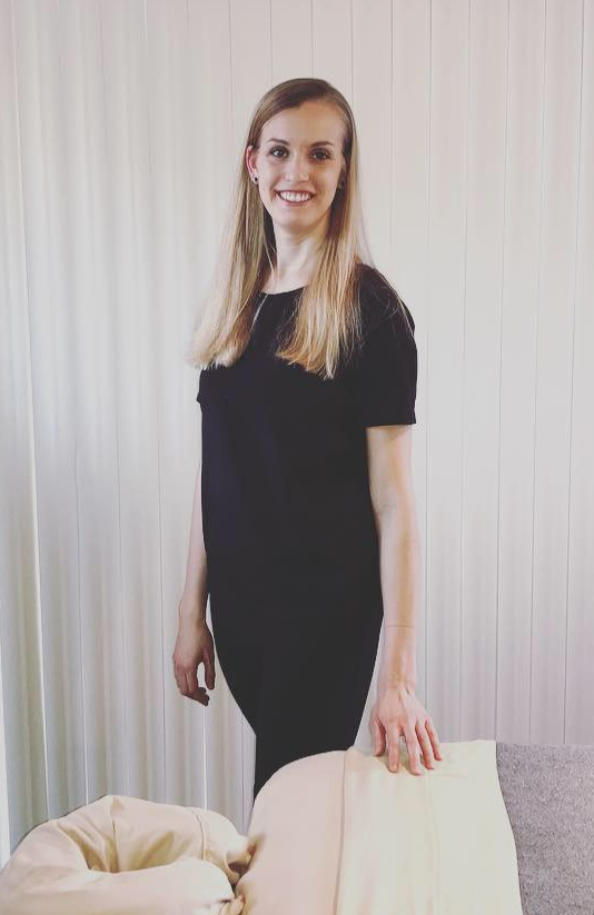 Leah Dahle 
Smiling woman in black outfit

