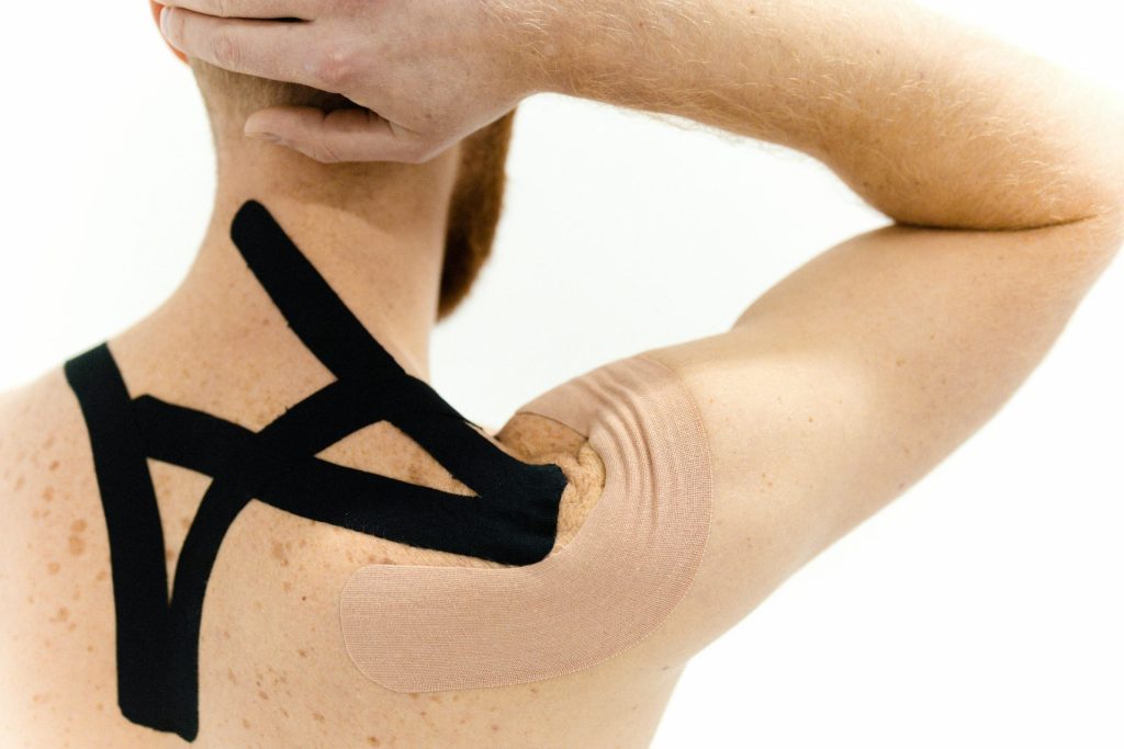 Athletic tape on shoulder and arm

